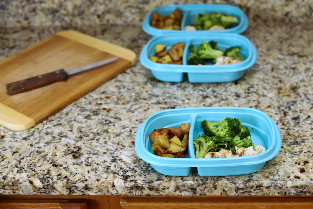Meal prep containers on a kitchen counter at home